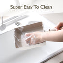 Chou Chou omelet pan being cleaned under running water with soft sponge – easy to clean