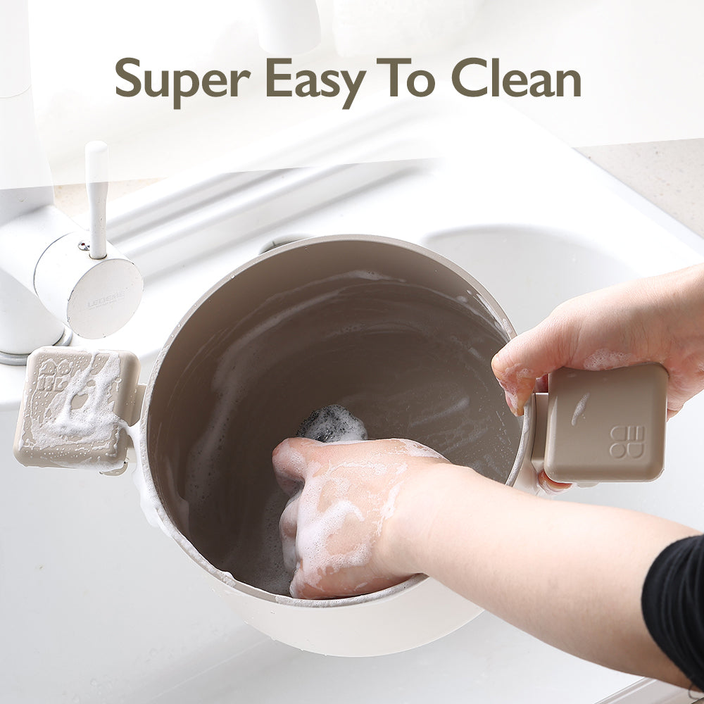 Chou Chou 8" Casserole being hand-washed under running water – easy to clean non-stick surface