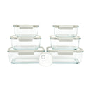 Set of Vacu Seal glass food storage containers with lids on a white background