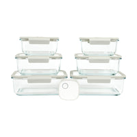 Set of Vacu Seal glass food storage containers with lids on a white background