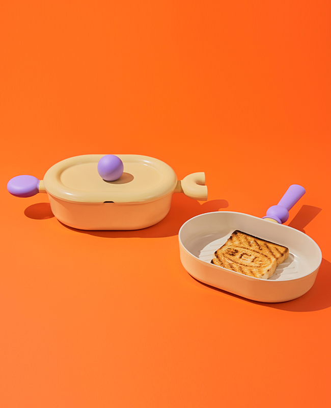 Bright orange setup showcasing the casserole with lid – colorful and modern kitchen vibe