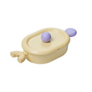 Better Finger 10" Casserole with pastel yellow rectangular ceramic body, dual purple ball handles, and matching lid on white background